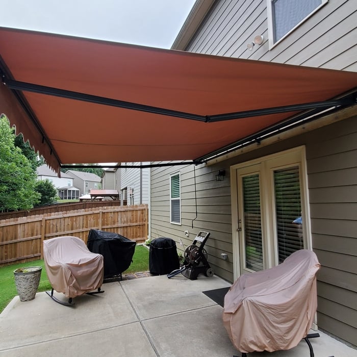 Such a pretty and relaxed looking patio. This awning made it complete.