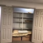 Suspected mold growth on closet doors.