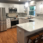 New Cabria Quartz Countertop with lifetime warranty. New Lighting and backsplash