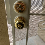 Security gate rekey and door knob installation