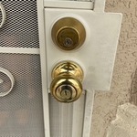 Security gate rekey and door knob installation