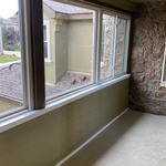 2nd story balcony sliding windows installation and trimming.