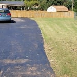 The beginning driveway was slick with the asphalt toppings and a drag to look at