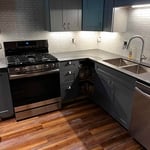 New kitchen, cabinets, flooring, tile, trim.