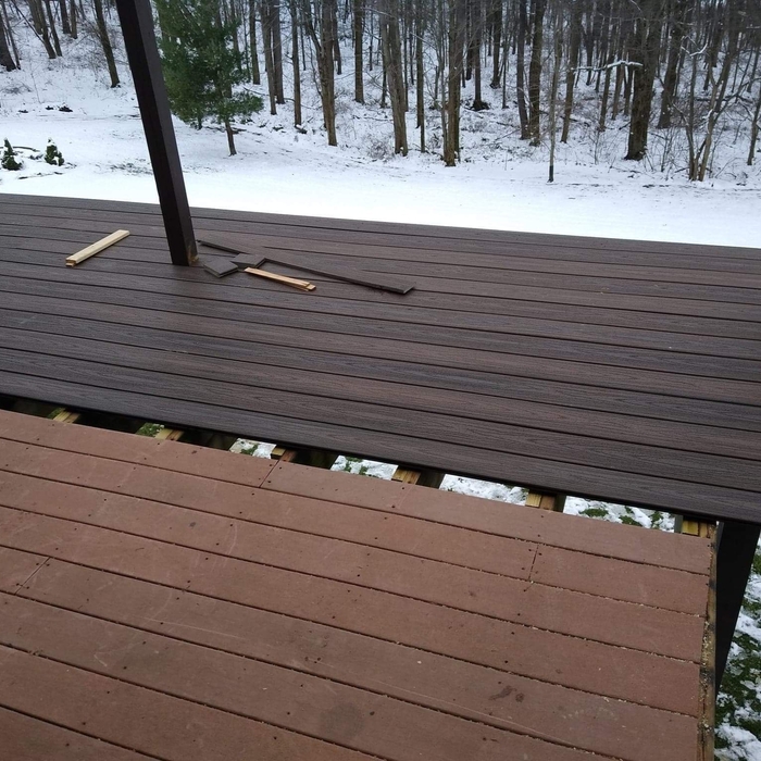 Extended Deck 2 ft- new decking is the darker wood.