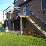 Old step, prior to moving and replacing steps. Removed railing/decking, then started to extend the deck.