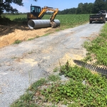 As you can see existing pipe was fairly new and storm water had been washing driveway away from top down