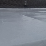 Convenience store roof was waterproofed with Silicone and it will now be cooler inside and leak free.