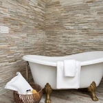 Custom stone wall in master bathroom