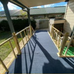 Complete custom built deck with wide ramp complete with outside weather proof carpet. Build Alto LLC. Did not furnish any material for this job.
