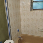 Before/ bathtub and ceramic wall tiles