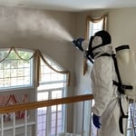 Fluid mist dispersing disinfecting fluid which sanitizes the air