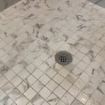 Post construction master shower cleaning. Clean side compared to post construction side