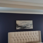Picture mounted per client specification to the bedroom wall