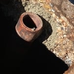 Repaired septic tank wall