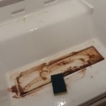 Before clean Bottom of refrigerator