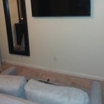 Mounted 60" tv, relocated the power outlet to behind the TV and hide all the remaining wires in there appropriateplaces