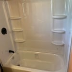 New shower body installed. New backing installed. Tub tested and approved!