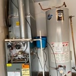 Old furnace, coil, and water heater.
Very Inefficient!!