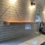Floating shelves and fire place mantel