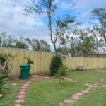 8' treated privacy fence to 6' treated privacy.