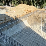 STEEL INSTALLATION .. during this time the family can sit back and relax while watching our Builders utilize the various techniques that are required to bending iand forming the steel to the shape of your new swimming pool