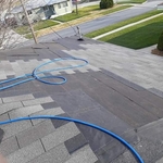 replacement of existing roof on house and garage