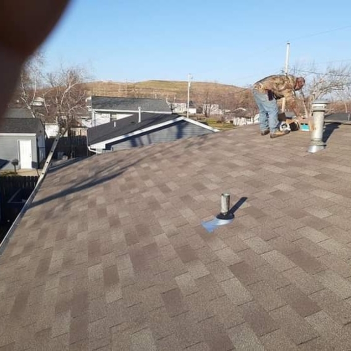backside of house finishing up last of cap row