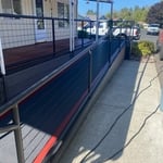 New deck,wheelchair ramp,metal tubing hand rails