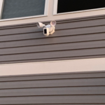 Ring Floodlight Security Camera installed on exterior of customers home