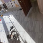 Beginning stages of Master Bath floor with Porcelain 12x24 tiles
