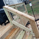 This specific deck came with custom hand rails, facia, underpenning, and access door.