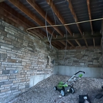 Process pictures of future hot tub area and lighting additions, with added outdoor weather proof GFCI outlet. Made any and all additions plus remodel with zero damage to household.