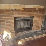 Brick removal has been done. Prepped for staining and setting of mounts to mantle. Mantelpiece is being prepped before wall retexture and paint.