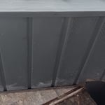 Took off siding and brick ,replaced with plywood and decorative rock