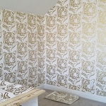 Wallpapering a room in the Attic