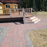 Pavers to form landing around steps, Herringbone.