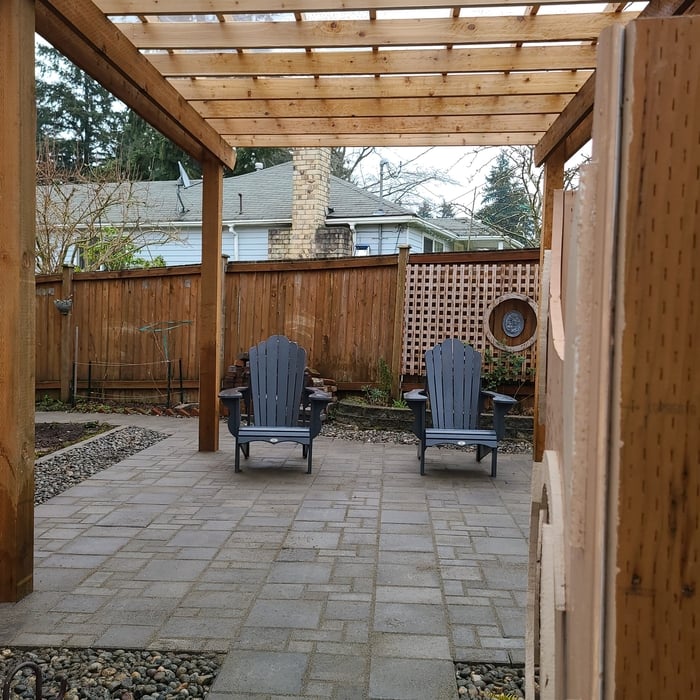Concrete pavers Cedar pergola