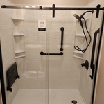 Replaced tub with a custom ONYX Collection Shower