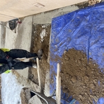 Saw cut concrete outside so we can hand dig down to pipe