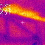 Thermal imaging shows the uninsulated ceiling allowing heat from the roof to penetrate the home.