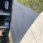 Driveway sealcoating