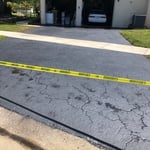Driveway sealcoating