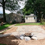 Natural irregular patio with fire pit