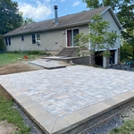This is the main patio area built with retaining wall block, caps and a 3 piece random paver set