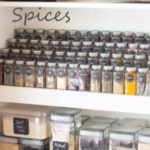 Spices organized by glass jars with labels