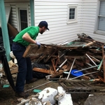 picking up destroyed building