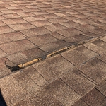 Compromised Roofing Shingles via Hurricane Damage