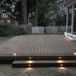 Timber tech composite deck. Only have one picture. I wish we would have gotten more of this one because it was a beautiful build.