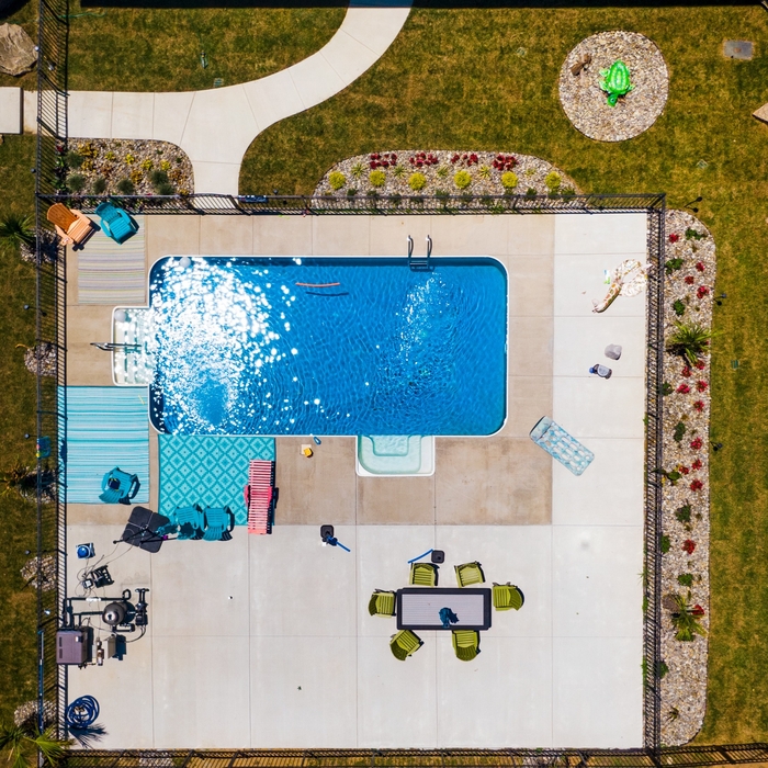Sod - 2,500 sqft
Drainage - Catch basin and French drain design
Planting - both native and tropical
Irrigation - Drip line spigot attached design
Concrete - 1,000 sqft
Boulders
Plant beds - New England river rock with steel edging